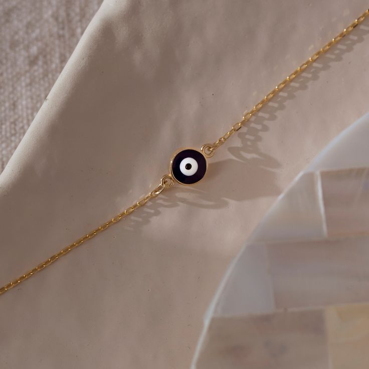 "14k Solid Gold Navy Blue Evil Eye Bracelet, Protection Bracelet ★ ★ ★Description★ ★ ★ ✓ Material: 14k Real Solid Gold ✓ Available Gold Colors: Yellow Gold, White Gold and Rose Gold ✓ Available Chain Sizes: 5\", 5.5\", 6\", 6.5\" , 7\" and extra 1\" inch Extender for all Chains ✓ Charm/Pendant Material: Highest Quality Glass ✓ Charm/Pendant Diameter: 0.24\" ✓ Ready to Ship in 3-4 Business Days ✓ International ★FREE★ Express Shipping ★ ★ Each order will be packed in a beautiful gift box★ ★ 🎁 PER Minimalist Evil Eye Bracelet For Everyday, Everyday Blue Tarnish-resistant Jewelry, Minimalist 14k Gold Bracelet As Gift For Her, 14k Gold Evil Eye Bracelet Gift, 14k Gold Filled Round Bracelets As Gift, Minimalist Everyday Evil Eye Bracelet, Minimalist Evil Eye Bracelet, Gold Evil Eye Bracelet For Everyday, Dainty 14k Gold Evil Eye Bracelet Gift