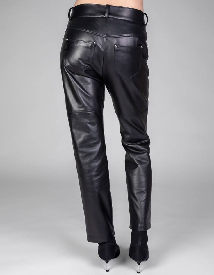 TECHNOCRACYBlack leather boyfriend-cut trousers with piercing details. Yoke and two patch pockets in the back. 5 belt loops. Cotton pipe finishing on inside. Upper fabric 100% Nappa leatherLining 100% AcetateModel wears size SFront length: 91cmBack length (excl. waistband): 95cmhem circumference: 35cmInner leg length: 70cmWaistband width: 5cmWaistband full measurement: 88.5cm Sleek High-waisted Leather Pants With Belt Loops, Black Leather Pants With Five Pockets, Chic Leather Pants With Belt Loops, Biker Pants With Belt Loops And Straight Leg, Leather Pants With Belt Loops For Fall, Luxury Bottoms With Five Pockets, Leather Straight Leg Bottoms With Pockets, Straight Leg Leather Bottoms With Pockets, Pants With Belt Loops Standard Cut