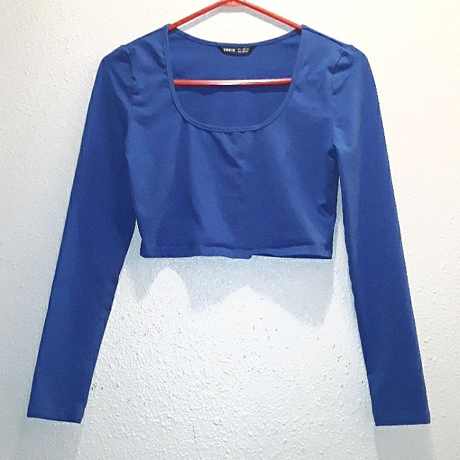 Shein. Size Medium. Long-Sleeve Crop Top. Bright Blue. Scoop Neckline. Form Fitting Material. Never Worn (Style Is Cropped Quite Short, Falls About 2 Inches Below Bust). Trendy Blue Long Sleeve Tops, Blue Cropped Top For Fall, Trendy Blue Long Sleeve Top For Fall, Blue Scoop Neck Top For Fall, Blue Cotton Crop Top For Fall, Blue Crop Top For Fall, Fitted Blue Long Sleeve Top For Spring, Blue Long Sleeve Top With Crew Neck For Spring, Blue Long Sleeve Crew Neck Top For Spring