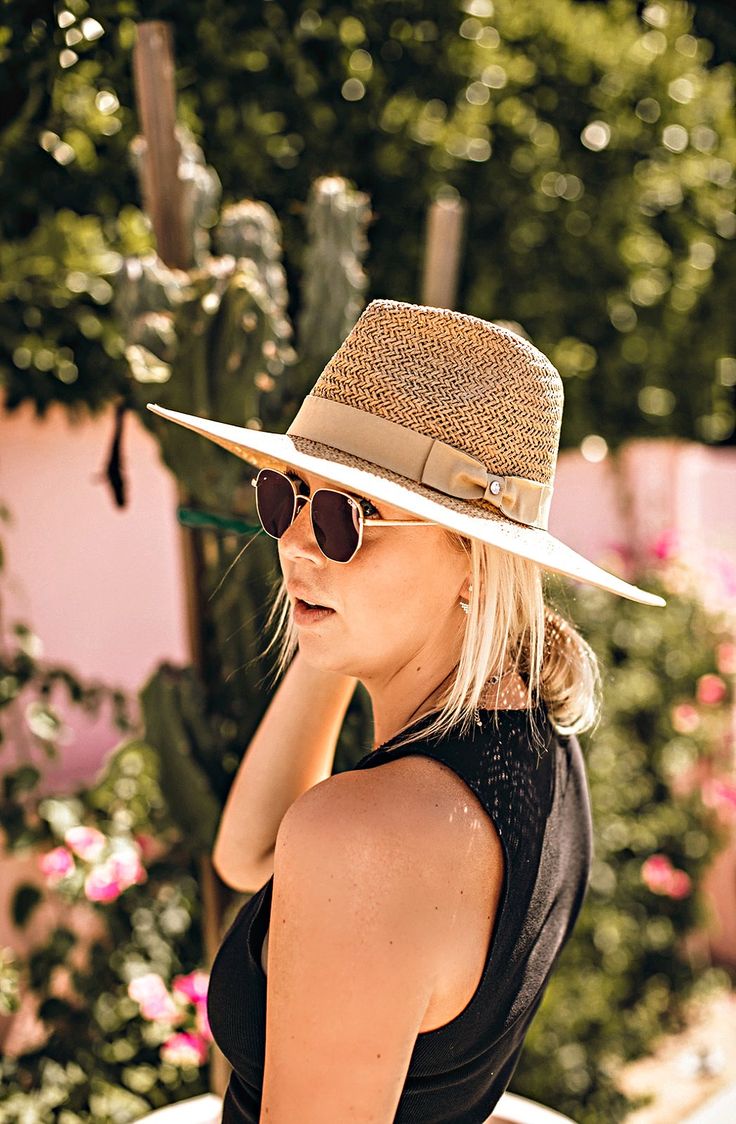 Our Palm Desert Panama fit in perfectly on our latest road trip photo shoot. Stunning, classic, chic - everything you've ever wanted in a hat. Featuring a molded crown with a pinched 10cm brim and hand woven straw, it's crystallized on the tone on tone ribbon with a simple Swarovski rivet. - 4" brim - Adjustable inner drawstring for custom sizing Chic Fedora For Beach And Kentucky Derby, Chic Fedora For Kentucky Derby Beach Day, Chic Fedora For Kentucky Derby At The Beach, Chic Spring Boater Hat Made Of Paper Straw, Chic Straw Panama Hat With Curved Brim, Chic Straw Fedora With Curved Brim, Elegant Travel Sun Hat With Curved Brim, Elegant Straw Hat With Curved Brim For Travel, Elegant Flat Brim Paper Straw Hat