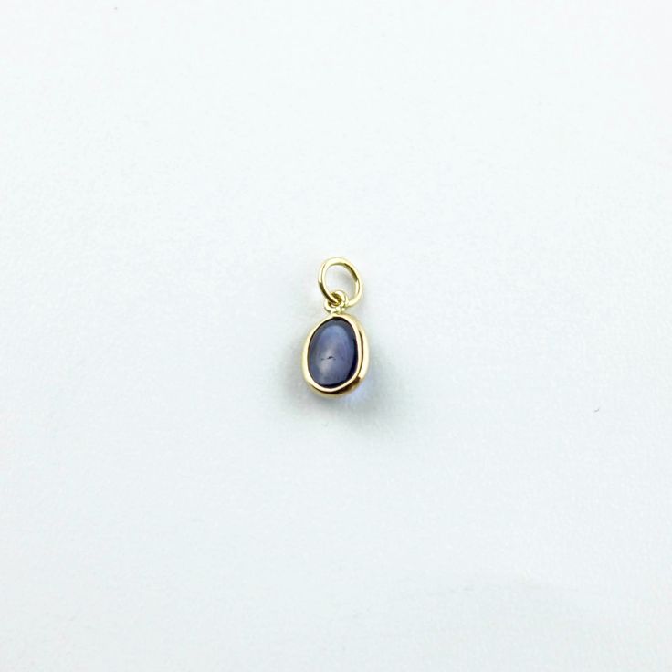 Material: 14k solid yellow gold (not gold plated or gold filled) Main Stone: Sapphire Main Stone Color: Blue Main Stone Shape: Oval Main Stone Creation: Natural Stone Size: 7x5 mm Carat Weight: 1.14 Carats Oval Birthstone Jewelry In Recycled Gold, Dainty 14k Gold Oval Cabochon Jewelry, Minimalist 14k Gold Oval Cabochon Jewelry, Minimalist Yellow Gold Cabochon Jewelry, Everyday 14k Gold Oval Cabochon Jewelry, Everyday 14k Gold Jewelry With Oval Cabochon, Gold Pear-shaped Jewelry With Bezel Setting, Dainty Yellow Gold Oval Cabochon Jewelry, Sapphire Cabochon