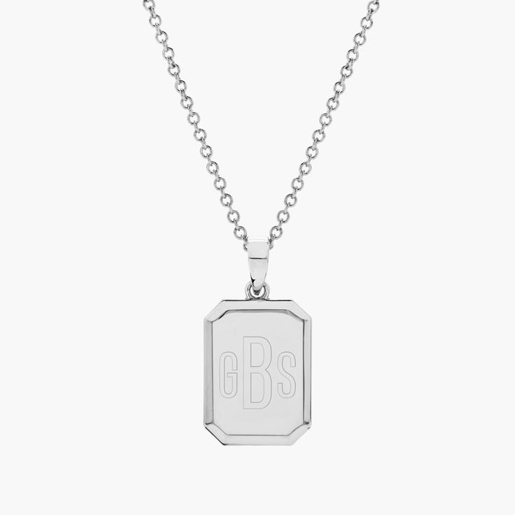 Anchor your latest layered look with our Willow Pendant Necklace. Our rectangular pendant is the perfect canvas for a bold monogram or initials and we love the delicate and timeless cable chain. Available in 14k gold plated, rhodium plated or 14k rose gold plated brass Pendant measures 3/4" by 5/8" 18" cable chain with 2" extender Lobster claw closure Made in the USA With engraving this item is FINAL SALE SKU: BYN1170 Elegant Silver Rectangular Initial Necklace, Classic Rectangular Initial Necklace, Silver Engraved Initial Rectangular Necklace, Classic Monogram Rectangular Jewelry, Luxury Rectangular Initials Jewelry, Classic Rectangular Jewelry For Personalized Gifts, Classic Engraved Initial Necklace With Rectangular Pendant, Elegant Jewelry Dog Tag With Initials, Trendy Rectangular Cable Chain Jewelry