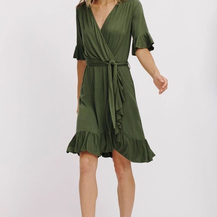 Nwt La Made Aileen Ruffle Wrap Dress In Dark Grey. Model Is Shown Wearing In Green. Photo To Show Fit Of Dress. Dress Is Knee Length, Ruffles Along Hemline And Sleeves, Wrap Style Top With Elastic Waist And Cloth Belt With Loops On Dress. Made Of 95% Micromodal And 5% Spandex. Measures 18” Along Bust And 38” Long. Dress Is Super Soft And Flowing! So Pretty! Flowy Belted Wrap Dress, Mid-length Ruffle Hem Dress For Brunch, Flowy Knee-length Wrap Dress For Brunch, Belted V-neck Dress For Brunch, Green V-neck Dress With Ruffle Hem, Green Flowy Dress With Surplice Neckline, Flowy Belted Midi Dress, Flowy Belted Dresses For Brunch, V-neck Wrap Dress With Ruffle Hem For Brunch