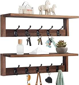 two wooden shelves with hooks and key holders on each shelf, one holding various items