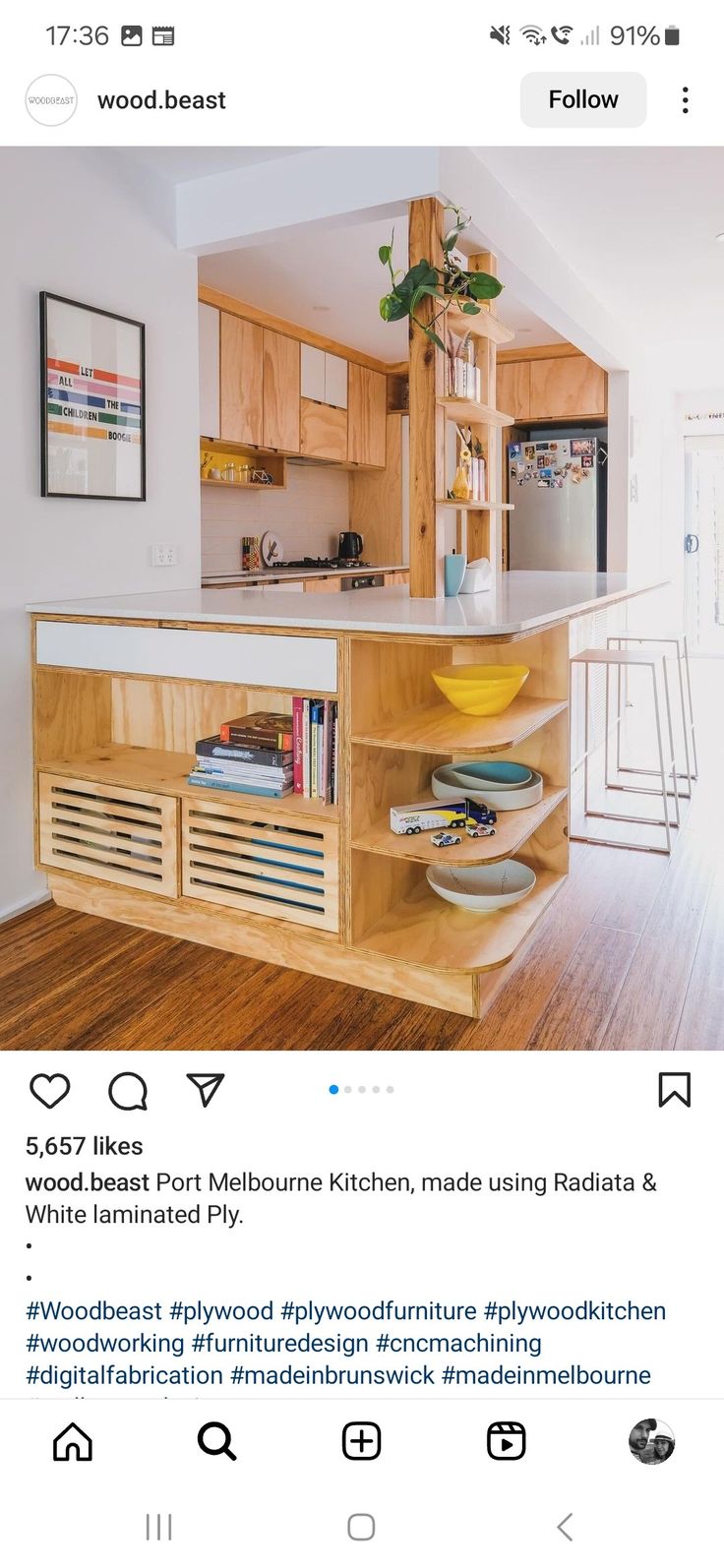 a kitchen with wooden cabinets and an island in front of the counter top is featured on instagram