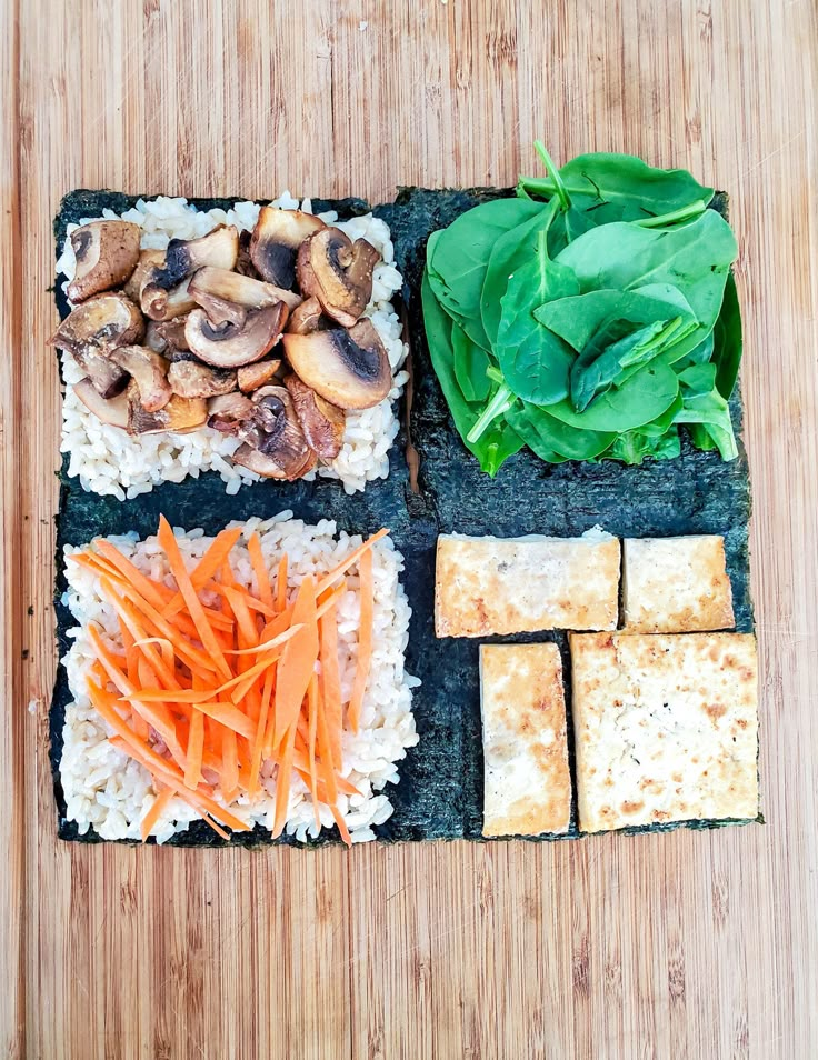 an assortment of food is displayed on a cutting board