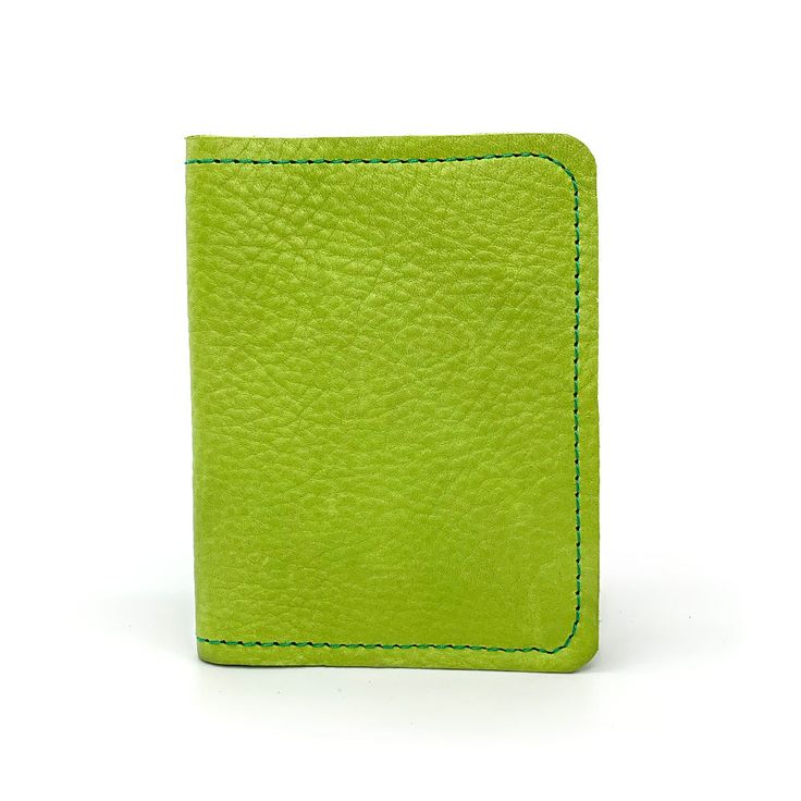 a lime green leather wallet with stitching on the front and side, against a white background