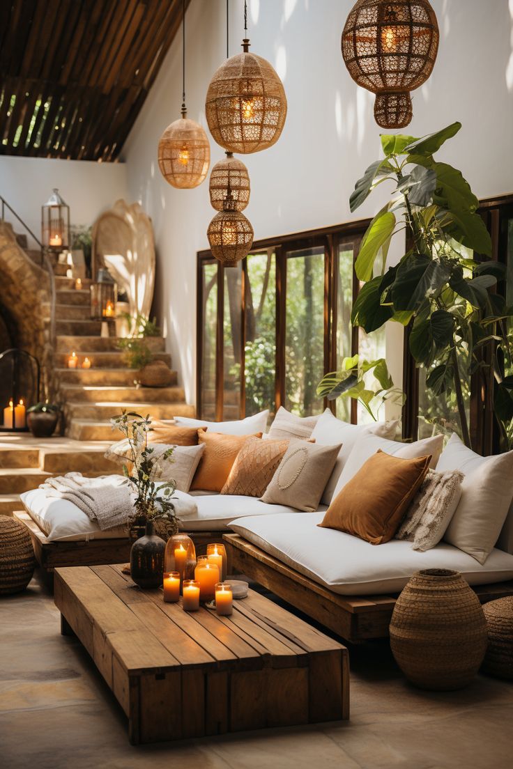 a living room filled with lots of furniture and candles