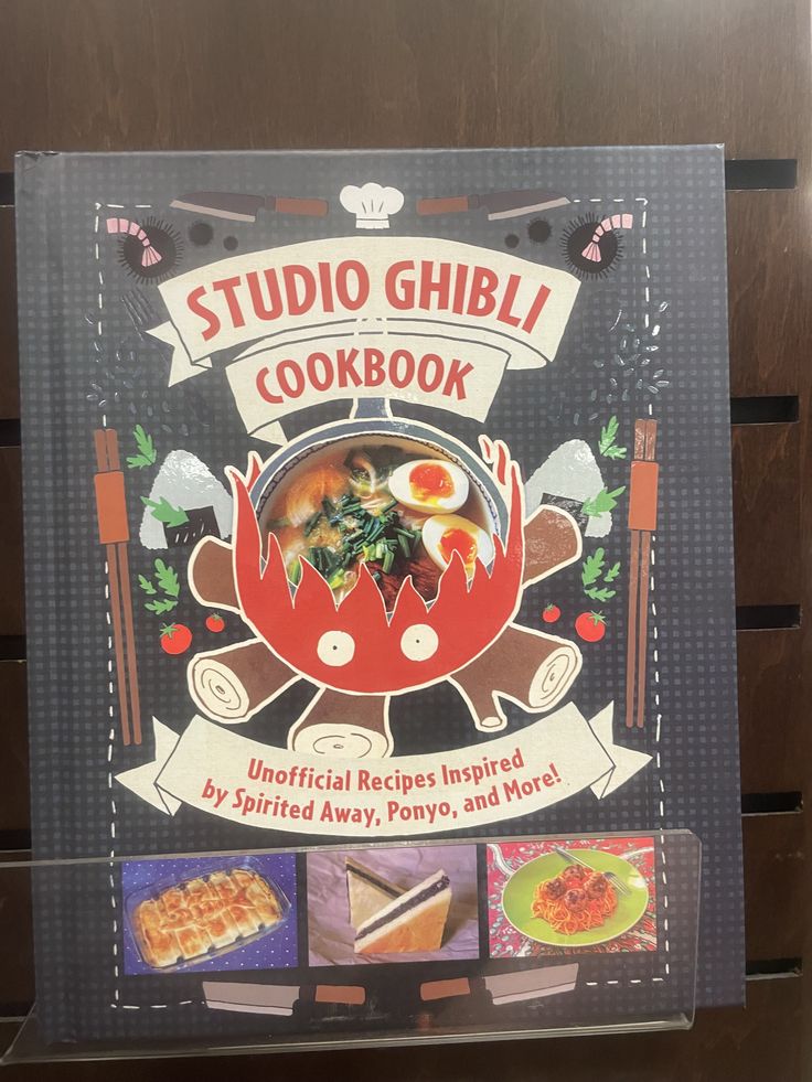 a cookbook with pictures of food on the front and back cover, sitting on a shelf