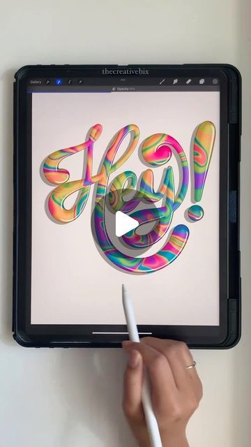 someone is drawing on an ipad screen with a white pen and using it as a marker