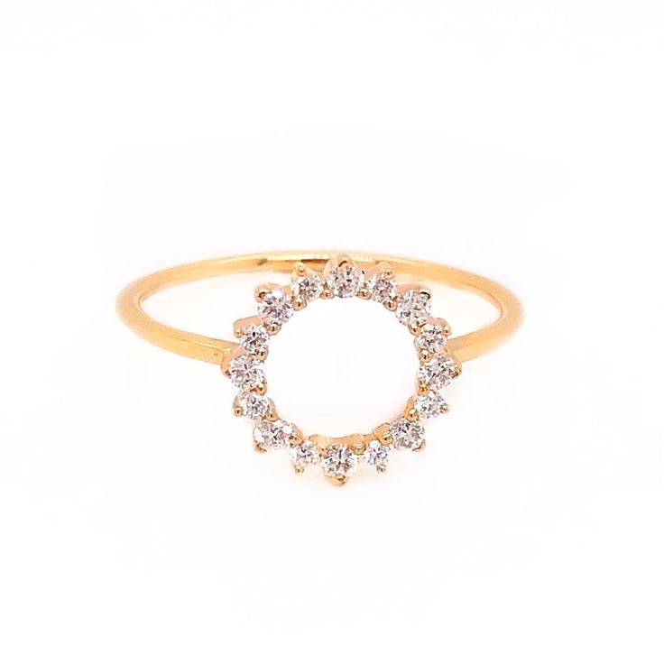 This ring adds a pop of sparkle to your look! With 0.23cttw round diamonds set in an open circle, it's the perfect statement piece. Available in 14K Yellow, White and Rose Gold. Rose gold is non-returnable!  If marked as pre-order, please allow 2-9 weeks for shipping! Modern Cluster Ring With Prong Setting, Luxury Round Halo Diamond Ring, Luxury Flower Ring With Halo Setting For Promise, Luxury Diamond Ring With Sparkling Stones For Party, Elegant Diamond White Crystal Ring With Sparkling Stones, Fine Jewelry Crystal Ring With Sparkling Stones For Party, Brilliant Cut Diamond Ring For Party, White Gold Fine Jewelry Rings For Party, Glamorous Anniversary Rings With Prong Setting