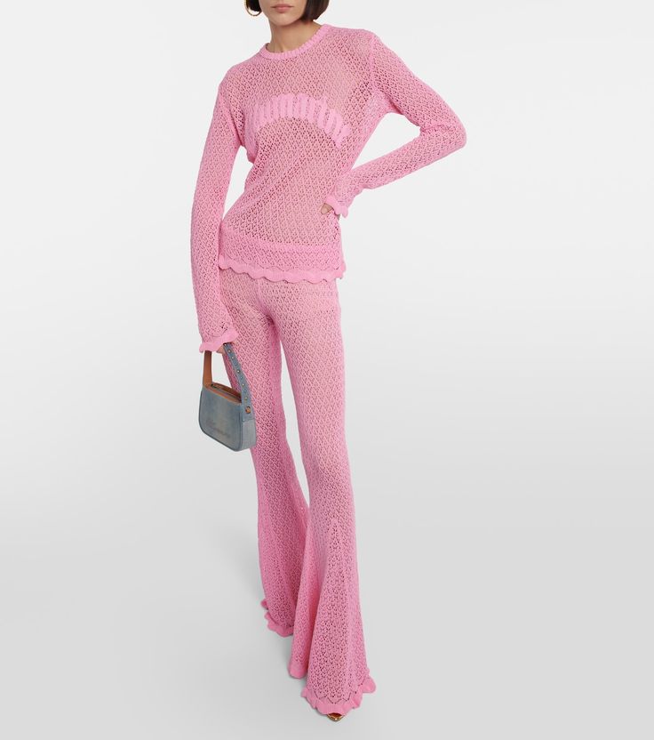 Crochet Flared Pants in Pink - Blumarine | Mytheresa Spring Wide-leg Flares, Summer Flares With Flared Hem, Chic Cotton Pants With Flared Hem, Pink Wide Leg Flares For Spring, Chic Pink Sets With Long Pants, Trendy Fitted Pink Flares, Pink Stretch Long Pants Set, Pink Stretch Sets With Long Pants, Trendy Pink Wide Leg Sets