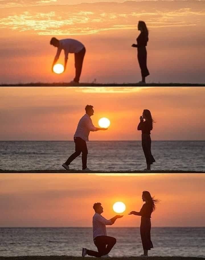 the silhouettes of two people holding hands at sunset