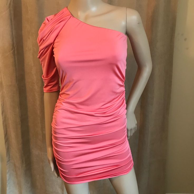 Nwot Sexy And Form Fitting. Length From Top To Bottom Approx 27” 92% Polyester And 8% Spandex. Color Is Coral. Summer Bodycon Dress For Night Out, Fitted One-shoulder Mini Dress For Going Out, Flirty One Shoulder Stretch Mini Dress, Flirty Stretch Elastane Dress, Flirty Elastane Dresses, One Shoulder Elastane Mini Dress For Night Out, Spring One Shoulder Stretch Bodycon Dress, Spring One-shoulder Stretch Bodycon Dress, Spring Stretch One-shoulder Bodycon Dress