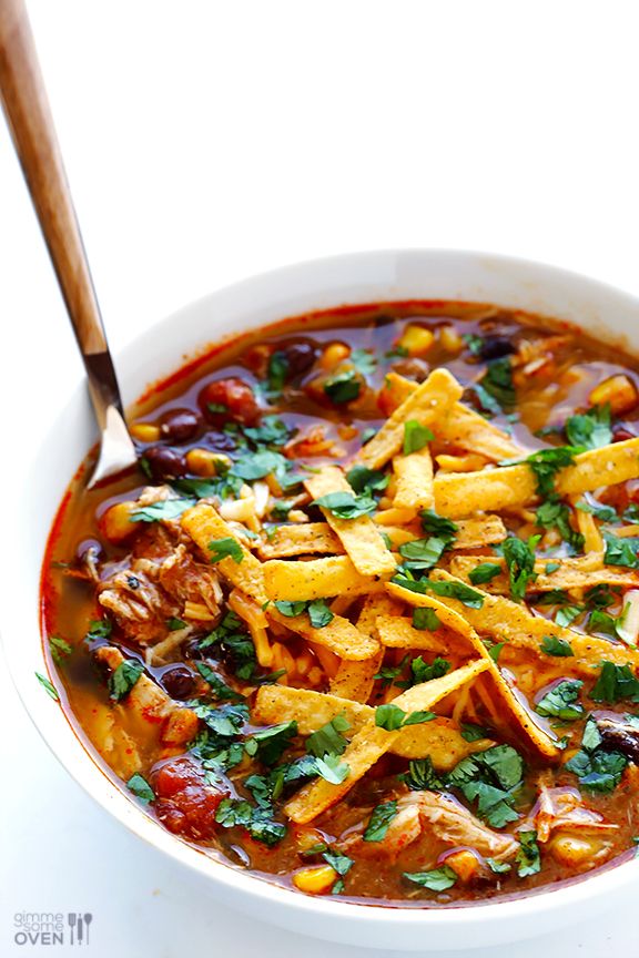 a white bowl filled with chicken tortilla soup