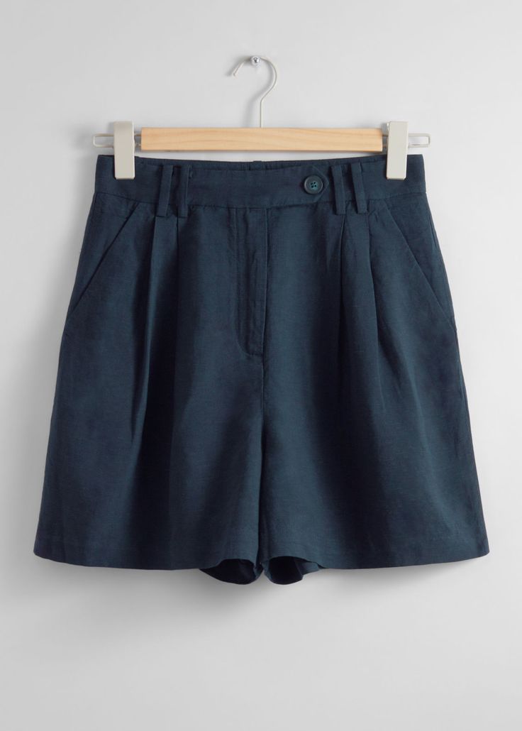 Tailored shorts finished with duo slash pockets.��• Belt loops• Welt pockets at the back• Length of inseam:10cm / 3.9" (EU 36 / UK 8 / US 4) High Waist Shorts With Side Pockets For Work, High Waist Shorts With Hip Pockets For Workwear, Blue Shorts With Side Pockets, Relaxed Fit High Waist Shorts With Welt Pockets, High Waist Relaxed Fit Shorts With Welt Pockets, Blue High-waisted Bermuda Shorts With Pockets, Bermuda Workwear Bottoms With Pockets, Summer Workwear Shorts With Pockets, Relaxed Fit Bermuda Workwear Shorts