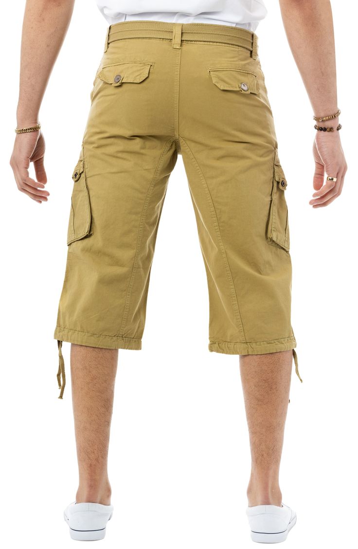 Style an on-trend look in cargo shorts crafted from breathable cotton for comfort during casual outings. 18" inseam; 10" front rise (size 32) Zip fly with button closure 100% cotton Machine wash, tumble dry
 Imported Model stats: 6'1" height, 32" waist. Model is wearing size 32. Military Style Cargo Shorts For Outdoor, Military Cargo Shorts, Military Style Cotton Cargo Shorts, Camouflage Military Shorts For Outdoor, Military Cargo Shorts For Outdoor, Long Shorts, Laid Back Style, List Style, X Ray