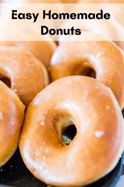 several glazed donuts sitting on top of a black plate with the words easy homemade doughnuts