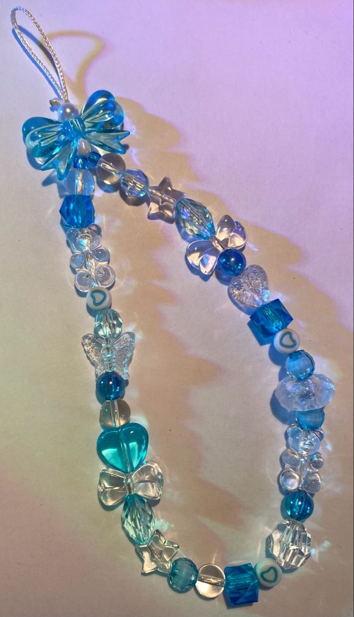 a bracelet with blue and clear beads