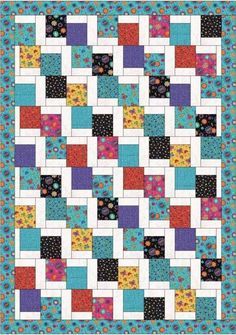 a colorful quilt with squares and dots on it