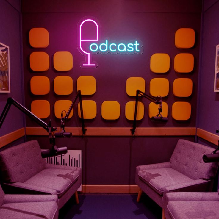 a purple room with two chairs and a microphone in front of a neon sign that reads'radiocast '