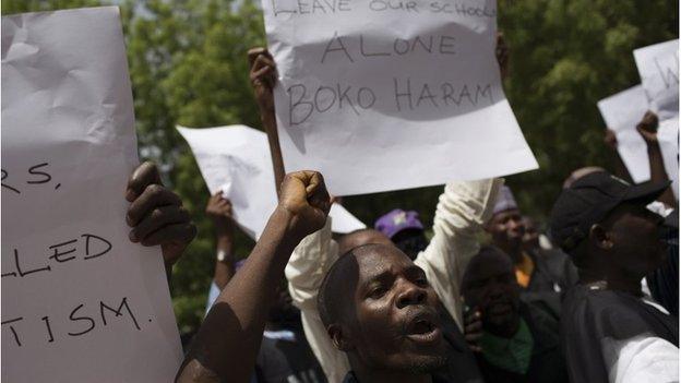 Teachers take part in a rally to call for the release of abducted schoolgirls held by Boko Haram and to demand better security in Maiduguri, 22 May 2014