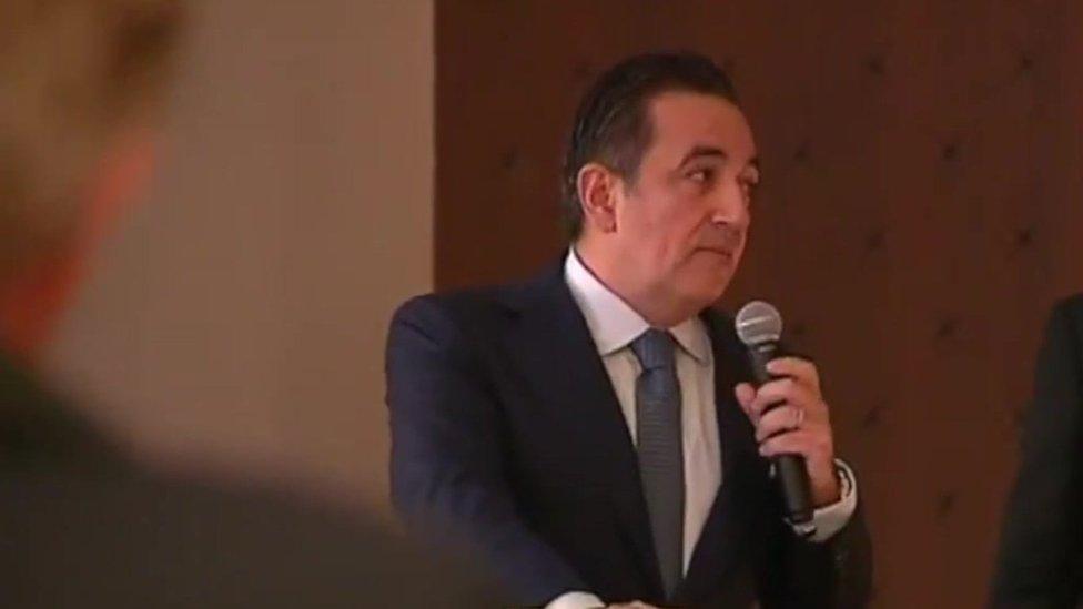 Javad Marandi speaking at an event