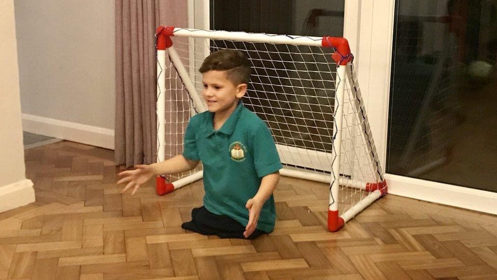 Romeo Hadley playing football