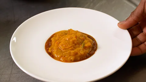 Ilya Shnitser Asaro, a porridge made with two kinds of yam: sweet potato and white yam tuber (Credit: Ilya Shnitser)