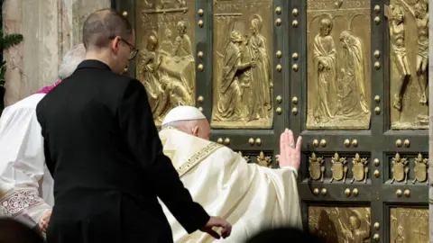 Pope Francis marked the start of the Jubilee year by opening the normally bricked-up Holy Door of St Peter's Basilica