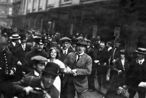 Alamy Unknown photographer, Annie Kenney (an Oldham cotton mill worker), arrested in London, April 1913