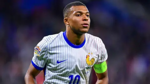 Kylian Mbappe in France kit