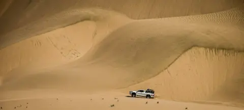 Sonja de Klerk A pick-up truck in the desert