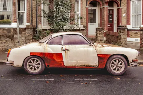 Carsten Schnoor A Karmann Ghia beside the road