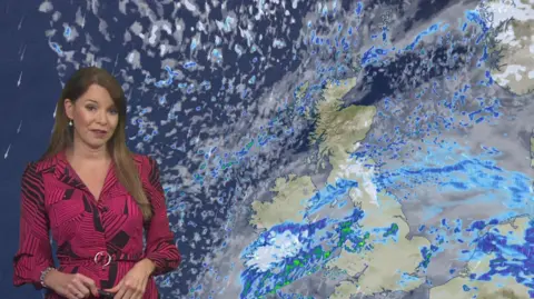 Elizabeth Rizzini stood with weather map of the UK