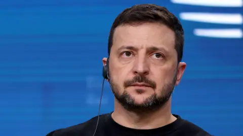 President of Ukraine Volodymyr Zelensky holds a press conference after attending the European Council summit in Brussels in October