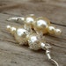 Creamy Ivory glass pearls, silver filigree bead caps Winter Wedding earrings