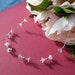 Miniature bouquets of flowers, wedding earrings in white and silver.