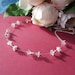 Wedding necklace, tiny white Lucite flowers, silver balls and chain