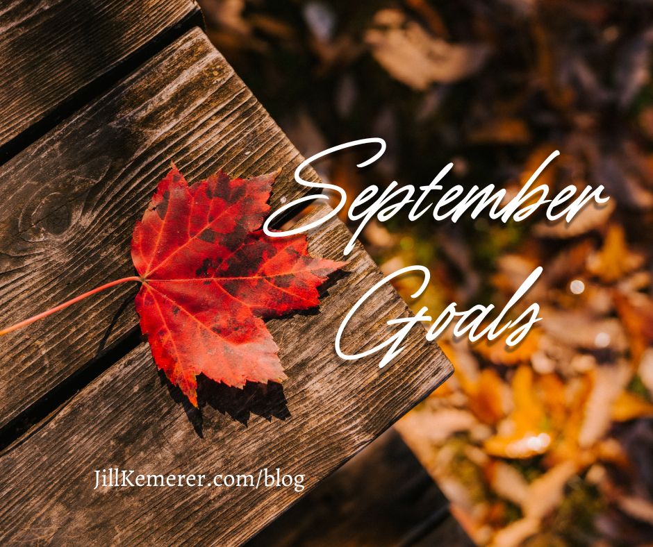 Edge of a wooden step with an orange leaf on top. Text, "September Goals, JillKemerer.com/blog"