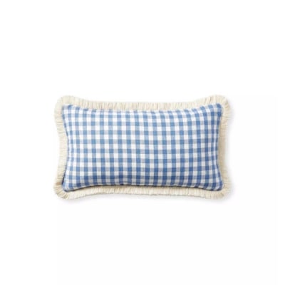 A blue and white pillow cover in a guide to Serena and Lily dupes