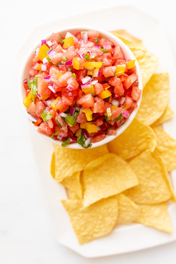 FRUIT SALSA IN A BOWL WITH CHIPS