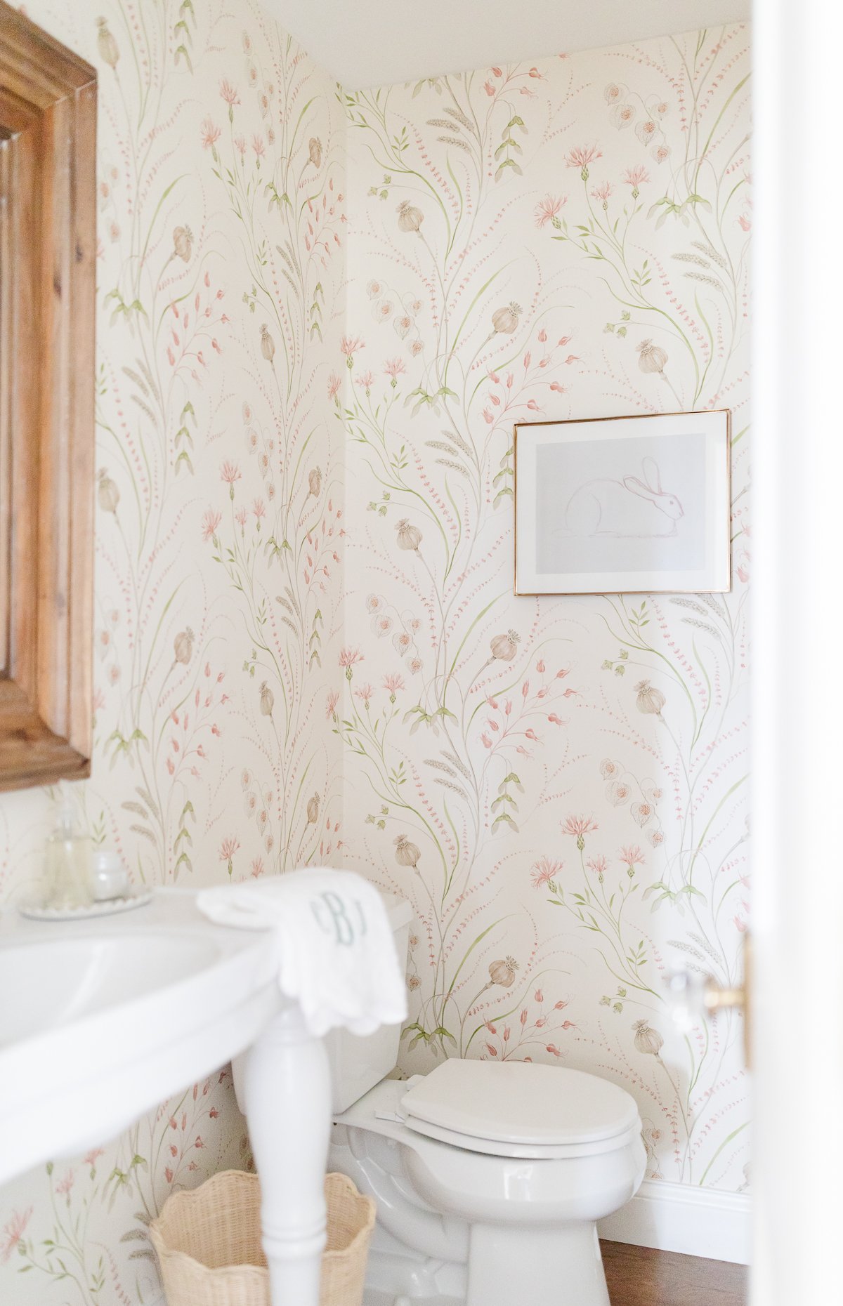 bathroom with floral wallpaper