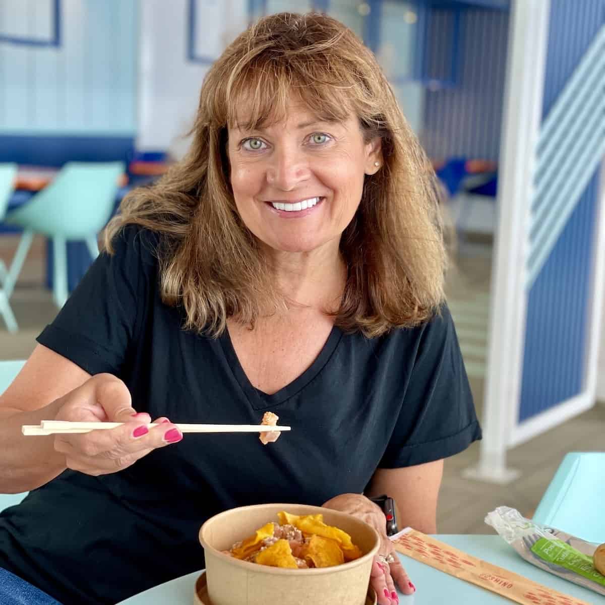 Kelly eating on a cruise ship.