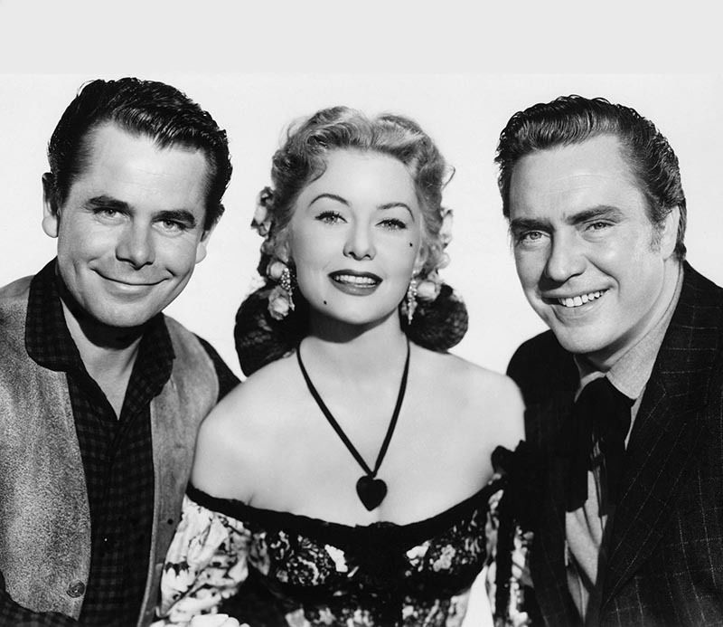 Glenn Ford, Rhonda Fleming, and Edmond O'Brien in The Redhead and the Cowboy (1951)