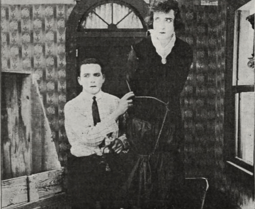 Ollie Kirby and George Larkin in Sign of the Scarf (1917)