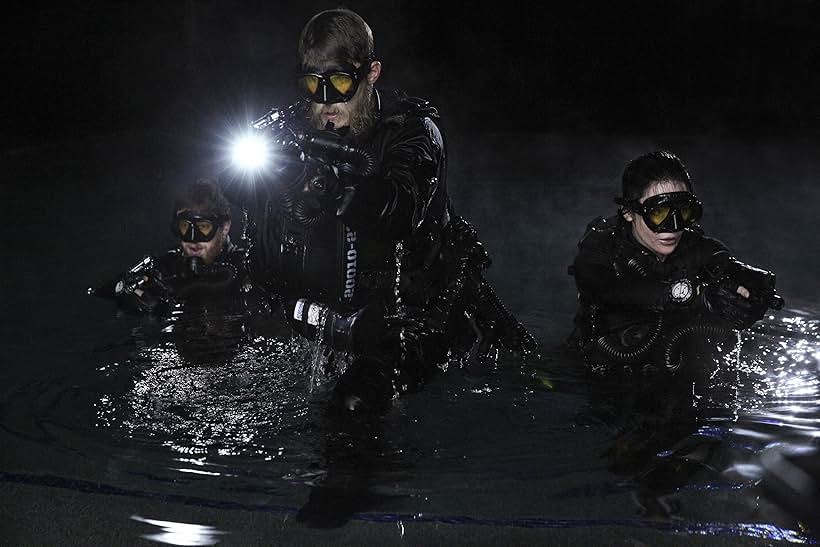 Travis Van Winkle, Bridget Regan, and Kevin Michael Martin in The Last Ship (2014)