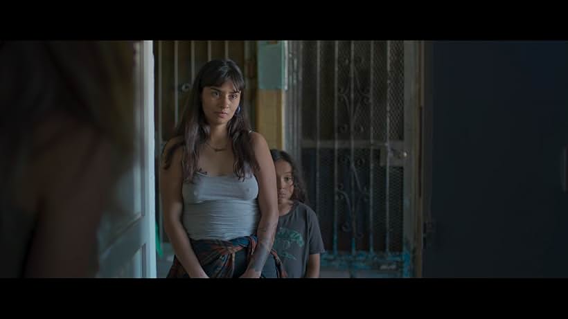 Julia Chavez and Israel Rodriguez in The Other Tom (2021)