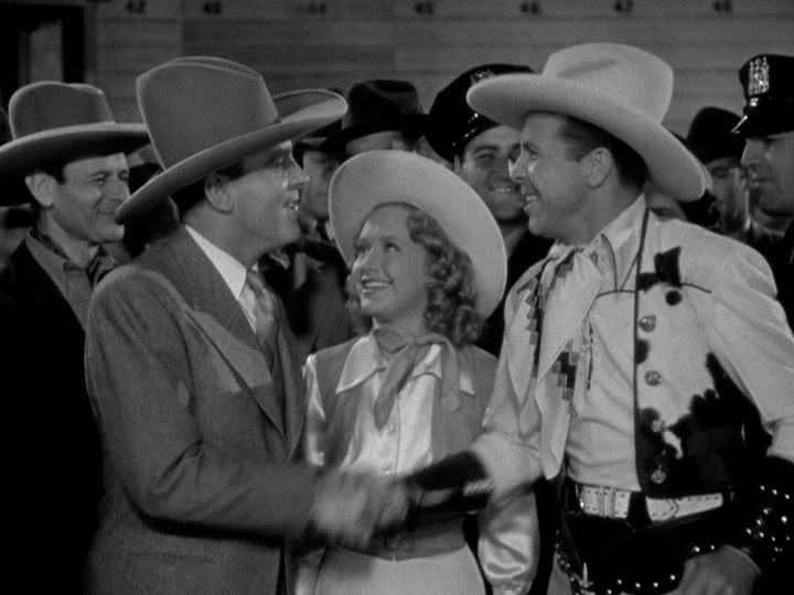 Pat O'Brien, Priscilla Lane, and Dick Powell in Cowboy from Brooklyn (1938)