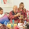 Kelsey Grammer, Spencer Grammer, and Uschi Umscheid in The 12 Days of Christmas Eve (2022)